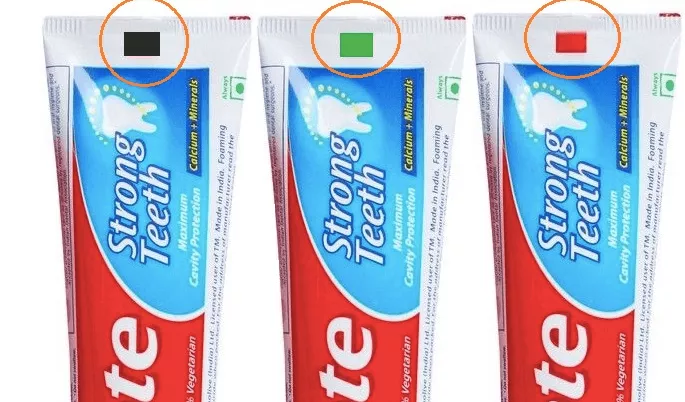 O Motivo Desses Quadrados Coloridos na Pasta de Dente