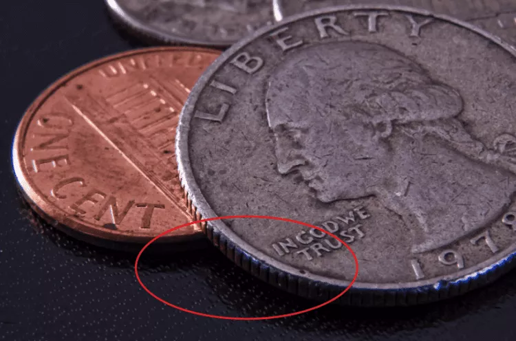 Por Que Há Relevos nas Moedas?